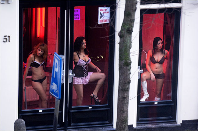 Prostitutes in the windows of a brothel in Amsterdam. (Wouters)
